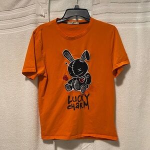 Lucky Charms Vibrant Orange Tee with Playful Design PP5